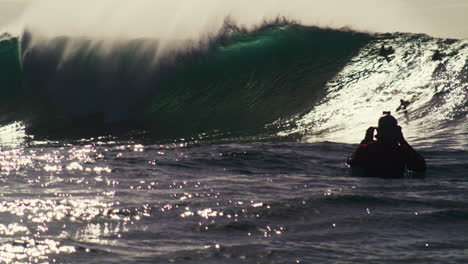 Frontal-view-of-glistening-light-across-wave-as-it-crashes-and-sprays-whitewash