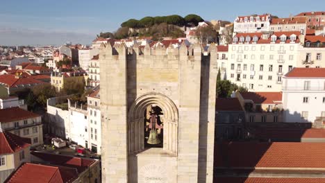 spectacular top drone view starting from the bells of the catedral sé patriarcal igreja de santa maria maior in alfama lisbon portugal europe