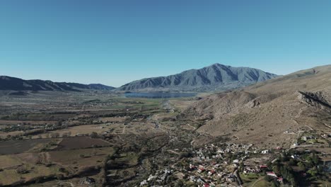 Artificial-lake-with-sky-blue-in-Tafí-del-Valle-in-Tucumán-city,-Argentina-with-Rows-of-mountain