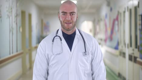 Portrait-of-a-happy-smiling-attractive-male-doctor