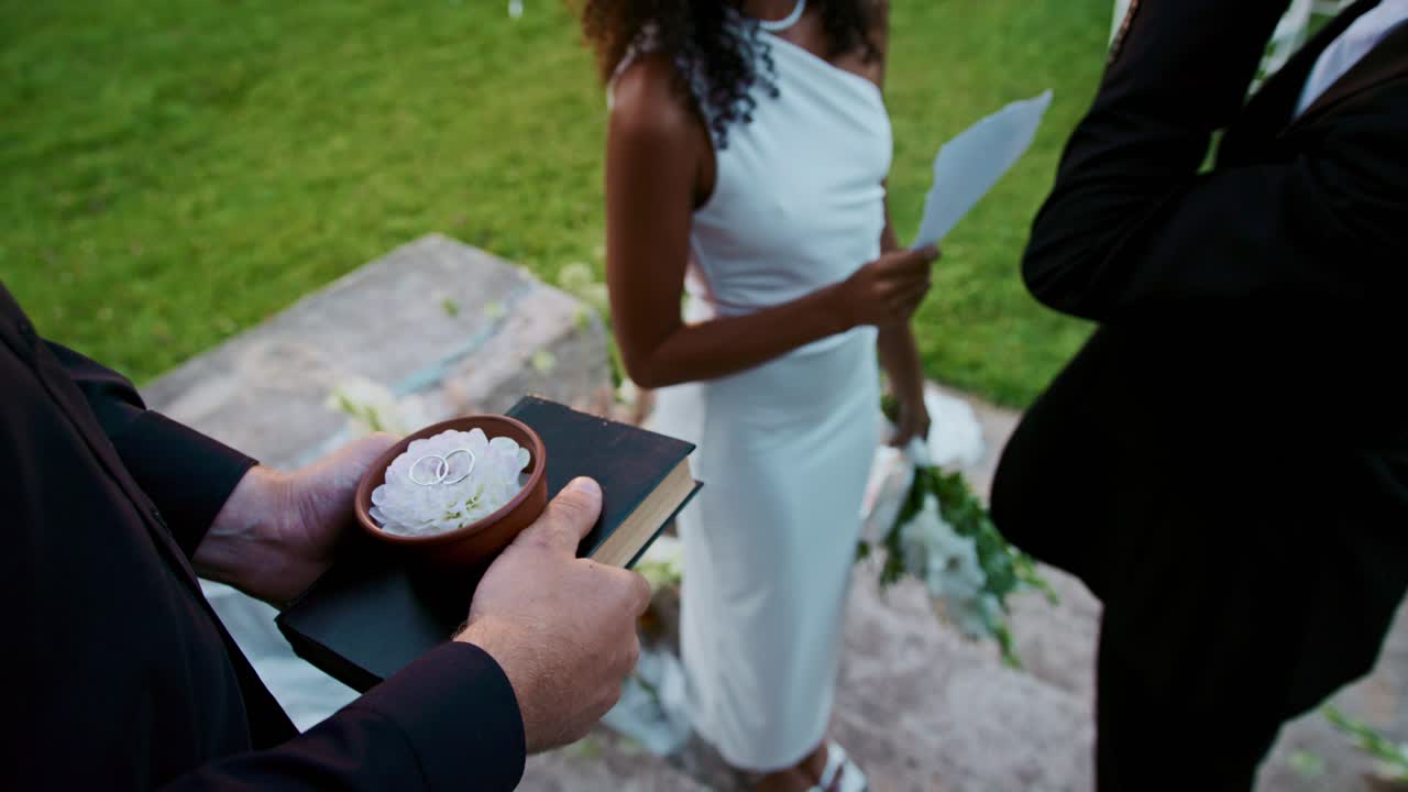 Wedding Ceremony with Bride, Groom, and Wedding Rings