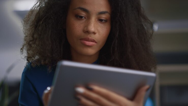 African american businesswoman using tablet