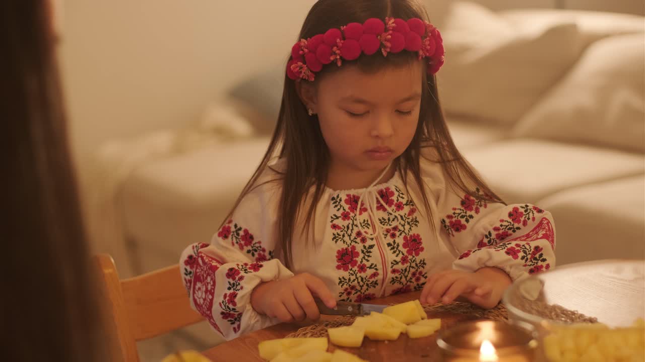 Mother and Daughter Preparing for Christmas Celebration