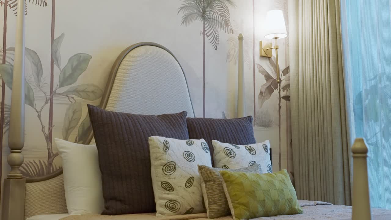 Comfy Interior Of A Bedroom With Nature Wallpaper Decor. Tilt-up Shot
