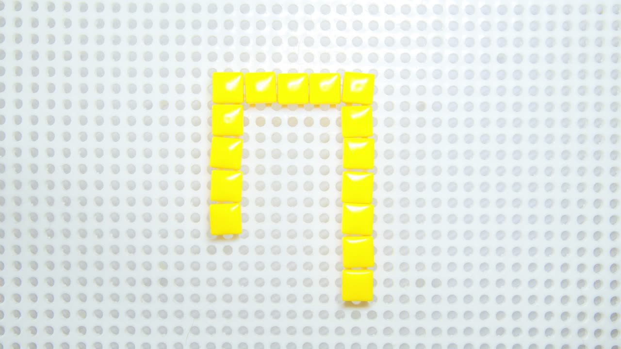 어린이 장난감으로 만든 한 번에 하나의 픽셀을 만드는 숫자 0의 정지 동작