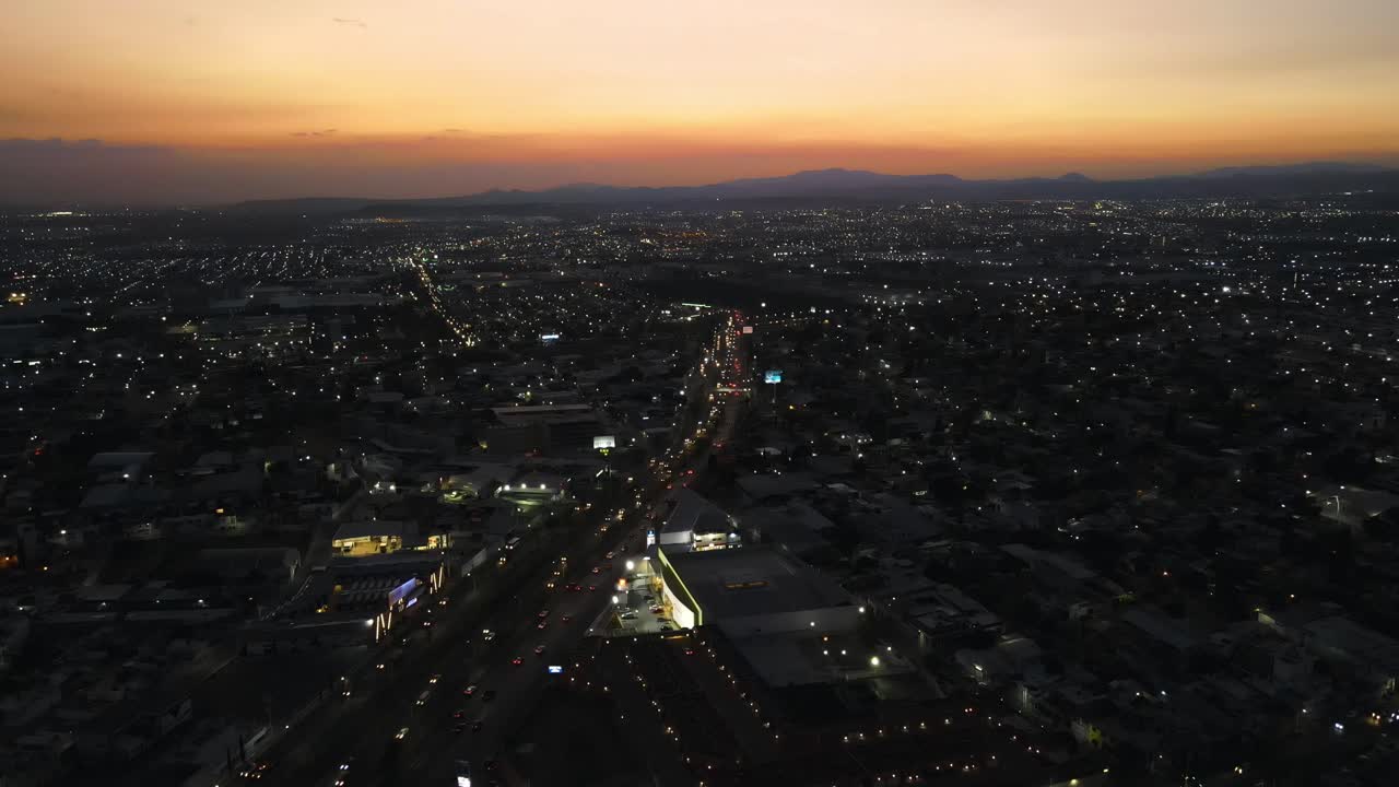 Panoramic aerial view during dusk in Queretaro, cinematic 4K.