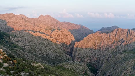 tranquil mountain landscape with panoramic sky and tree-filled valley