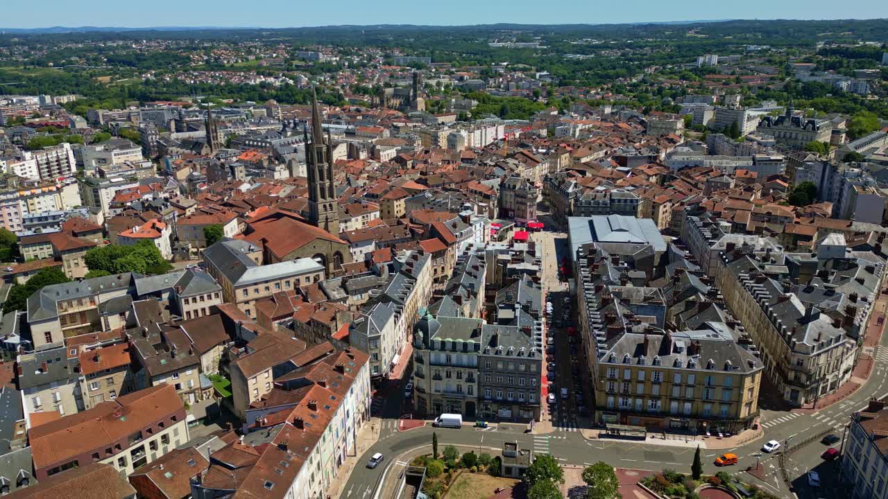 Saint-Michel-des-Lions Basilica in Limoges, France. Aerial drone backward, cityscape