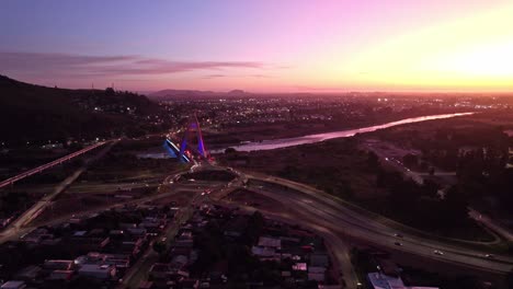 aerial view of treng treng kay kay bridge over cautin river at dusk between temuco and padre las casas in chile