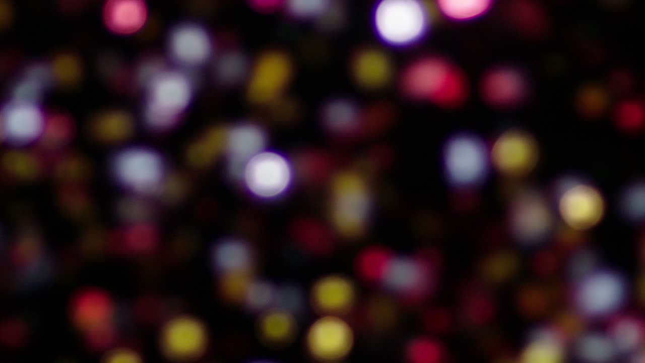 Glitter Bokeh Isolated on Black Background