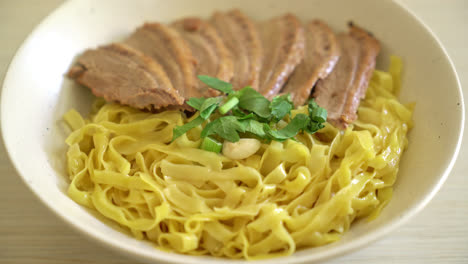 dried duck noodles in white bowl - asian food style