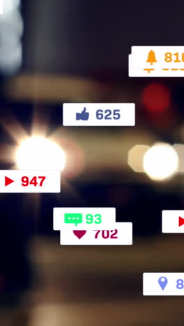 animation of social media icons and numbers over out of focus city and traffic lights