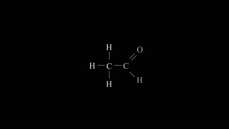 fórmula química del acetaldehído sobre un fondo negro