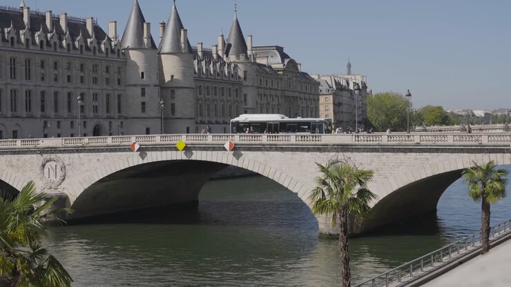 Pont Saint Michel Bridge Crossing River Seine In Paris France With Tourists And Traffic