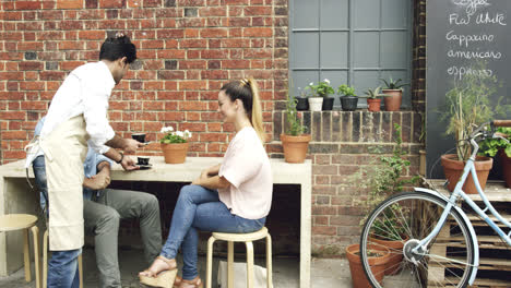 couple dating drinking coffee in cafe