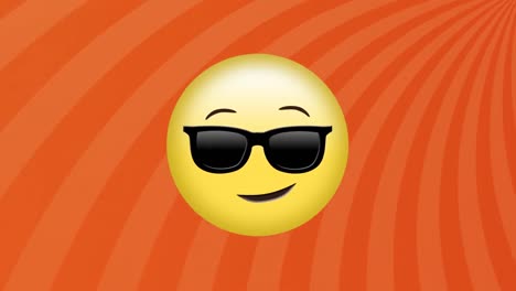 Animation-of-sunglasses-face-emoji-against-radial-rays-in-seamless-pattern-on-orange-background