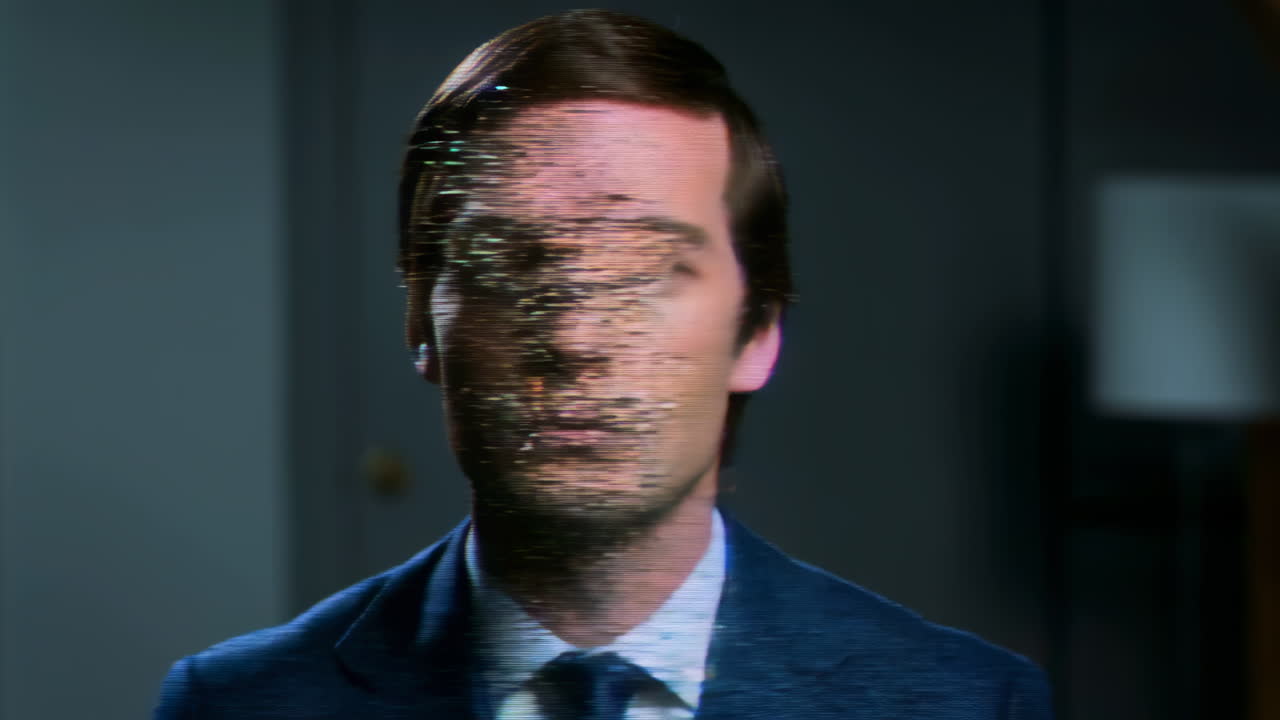 Man's Face Glitching and Pixelating with Colorful Digital Effects