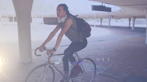 animation of light spots over biracial man cycling