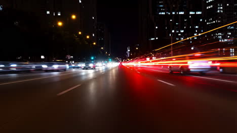 Long exposure light trails on a city street at night