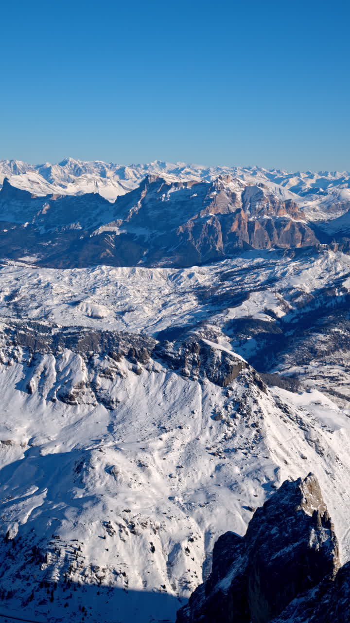 View of snow on the mountains in the Dolomites, Italy. Vertical