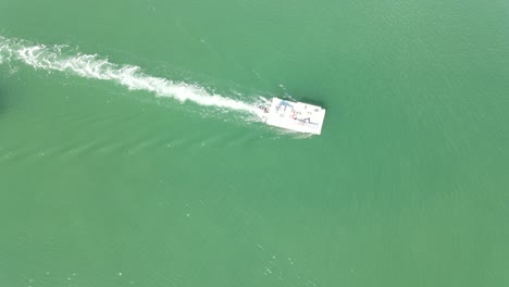 boat moving through channel - aerial view