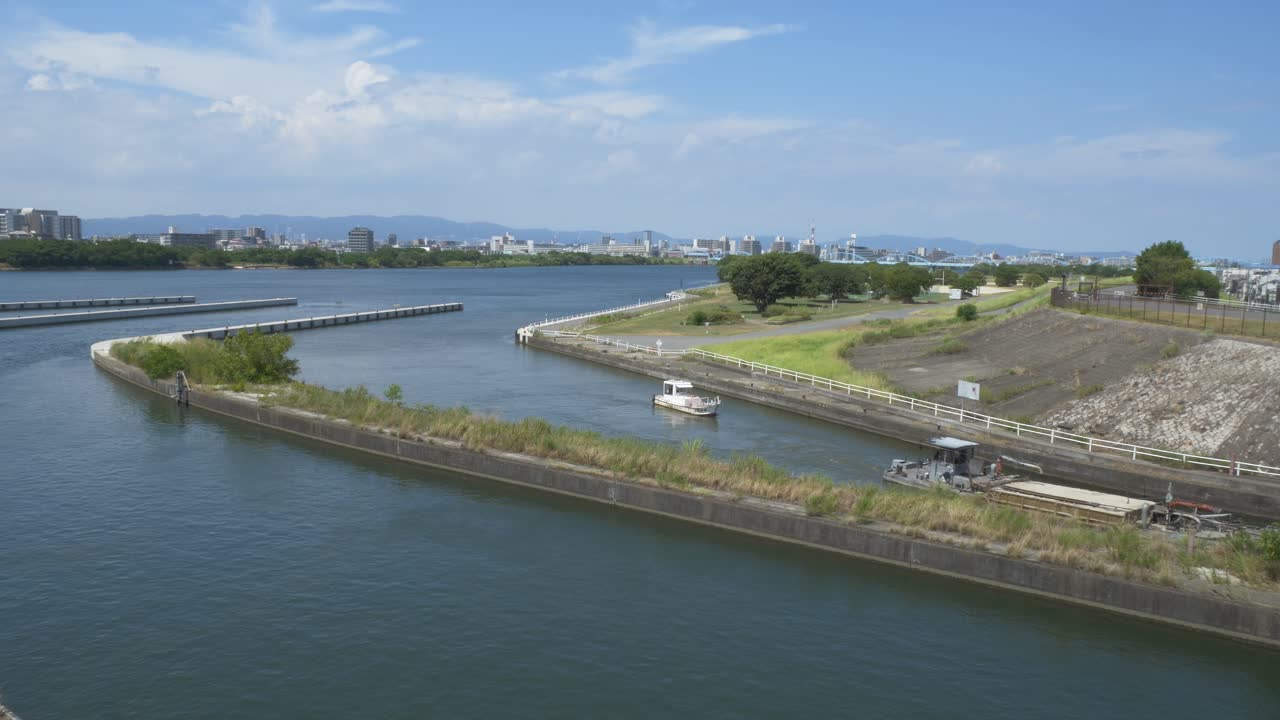 Barge And Tug Boat Entering The Kema Lock Gate By Yodo River In Osaka, Japan. - wide shot