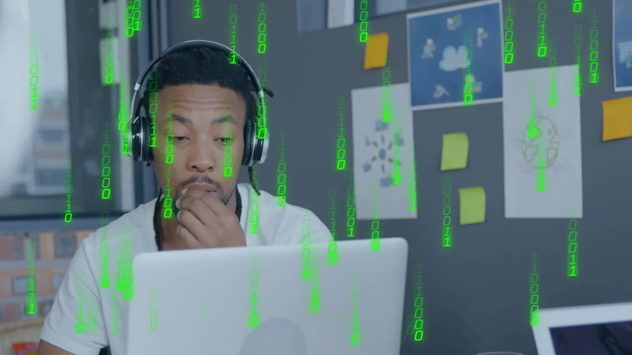 Animation of binary coding data processing over african american businessman in office