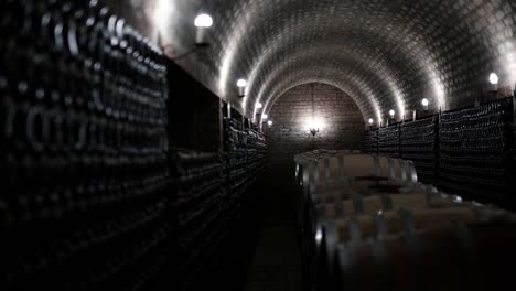 luxury underground wine cellar with wine barrels in the center