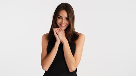 caucasian woman posing in front of camera.