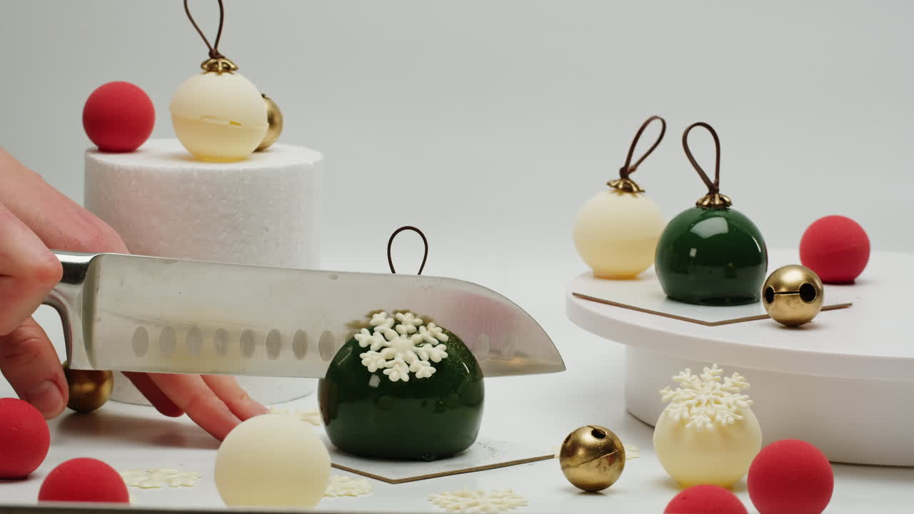 Cutting a Christmas Ornament-Shaped Dessert