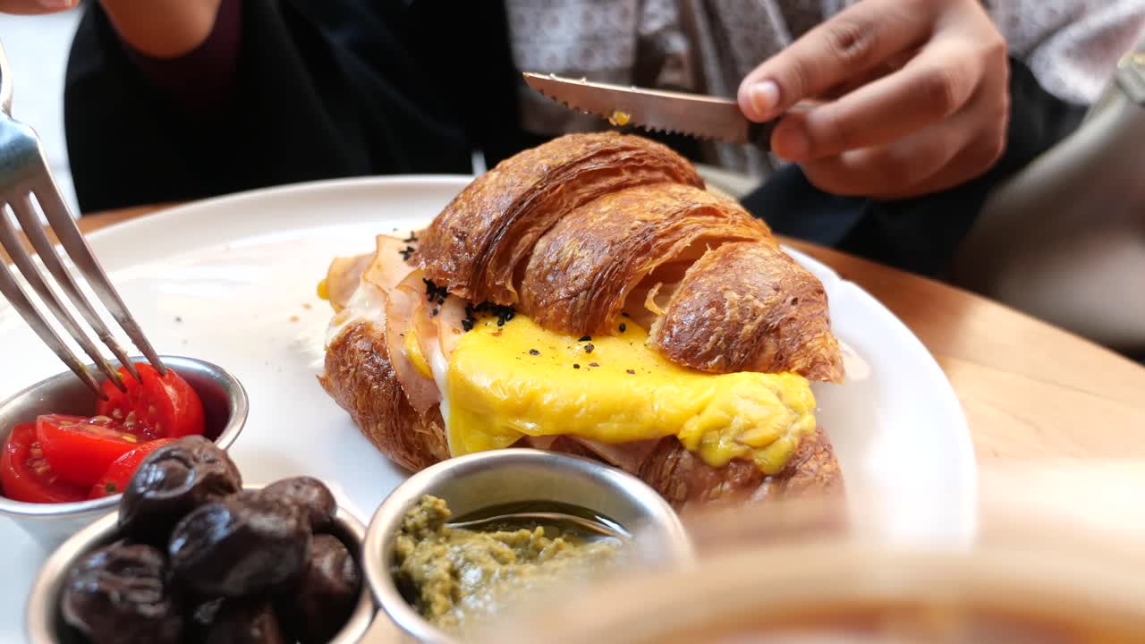 Croissant Sandwich with Tomatoes and Olives