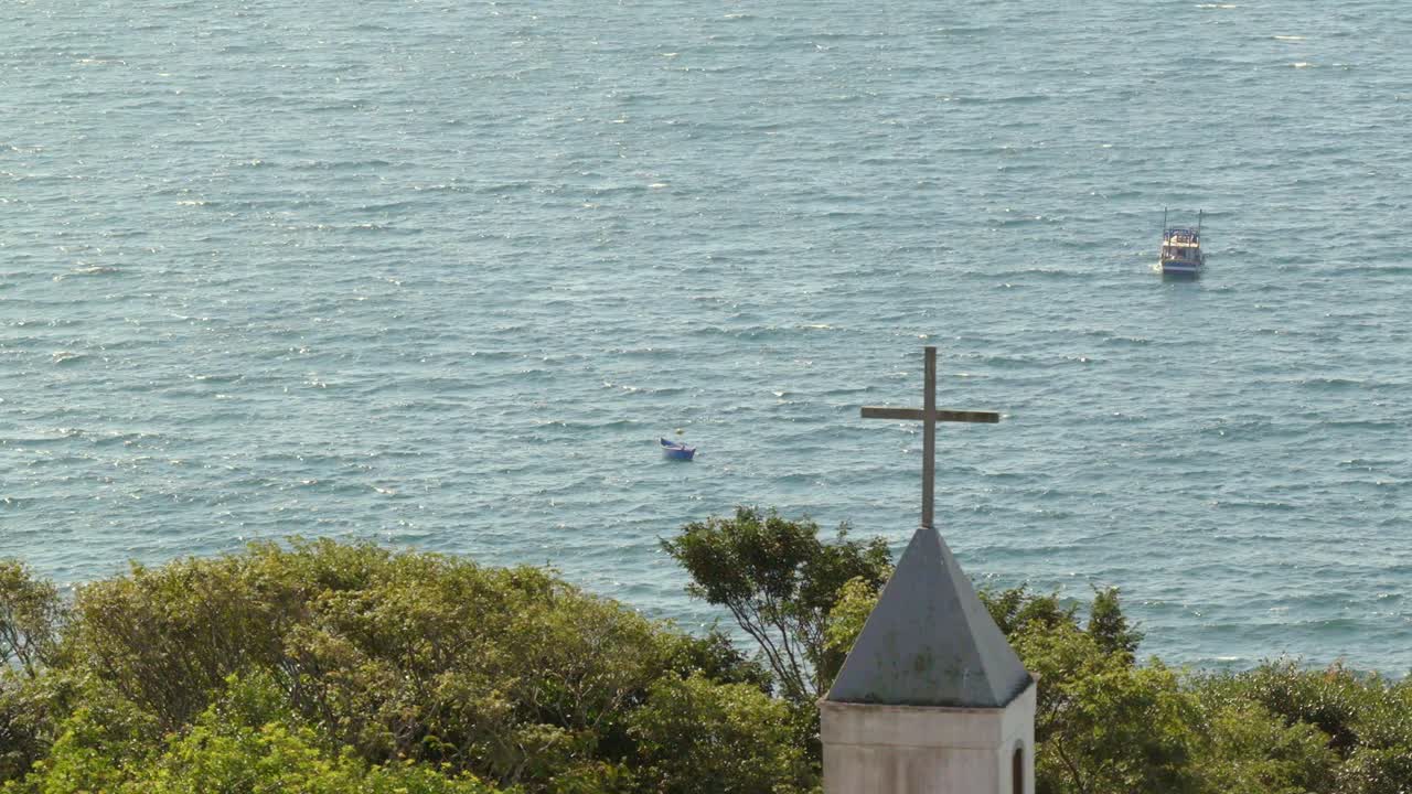 Chapel tower with cross facing the Atlantic Ocean, Nossa Senhora da Imaculada Conceição, Bombinhas, Santa Catarina, Brazil