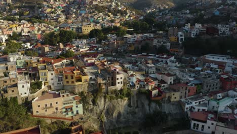 aerial view of mountain city to reveal baseball stadium, guanajuato city, mexico