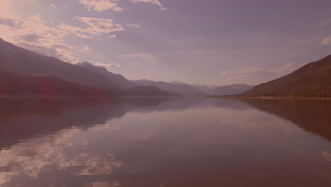 View-of-landscape-with-lake,-mountains-and-clouds-in-the-blue-sky