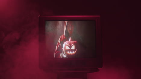 halloween themed image of a man holding a carved pumpkin on a vintage tv