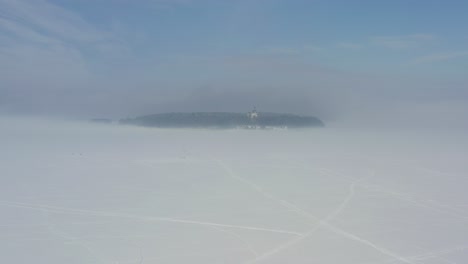 frozen kaunas sea. drone aerial view. foggy winter morning
