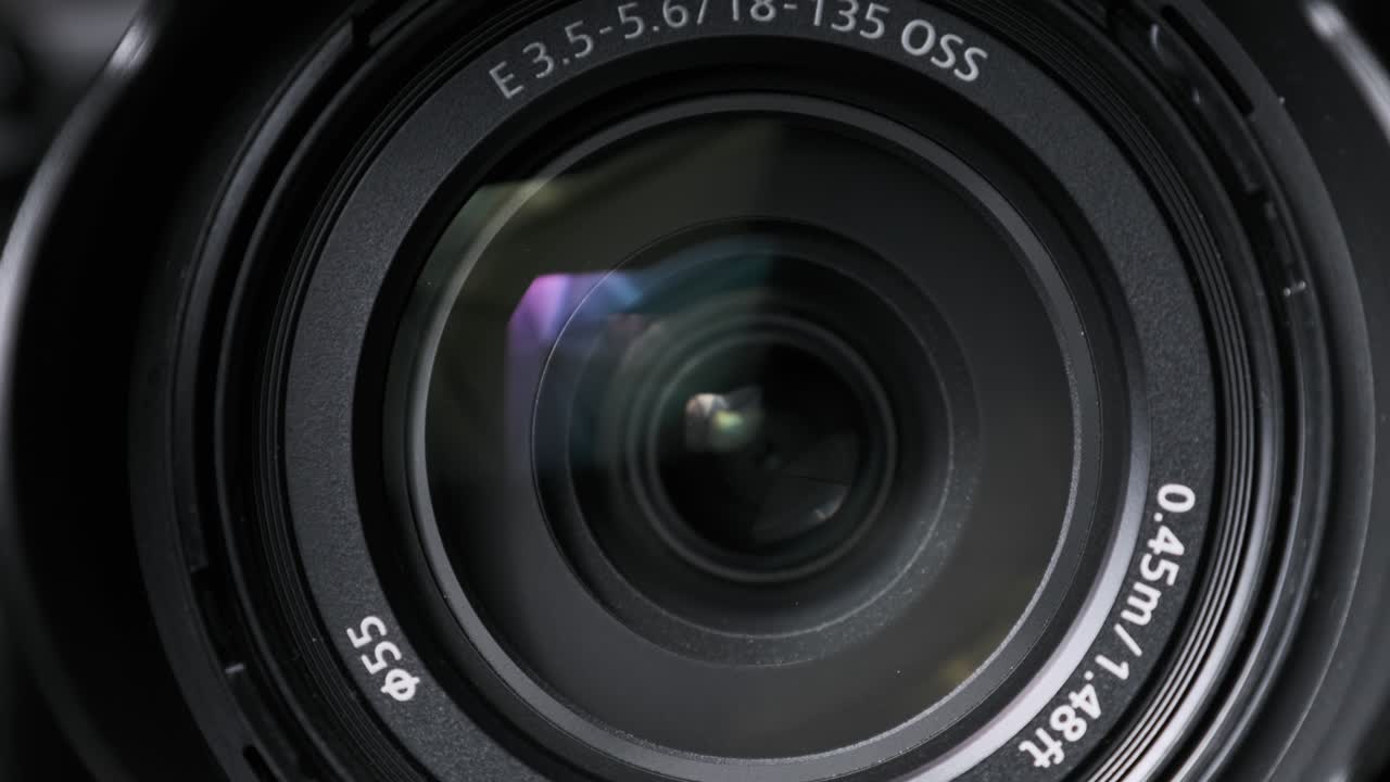 The Camera Lens Rotates, Lights Reflecting Off Glass, Robotic Camera Movement