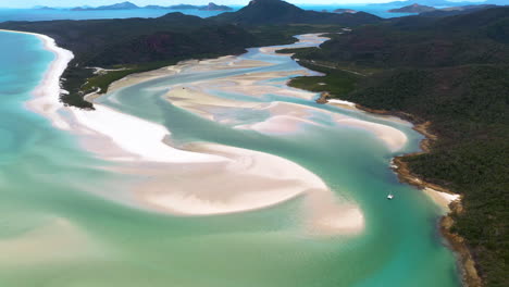 revealing cinematic drone shot of whitehaven beach whitsunday island australia