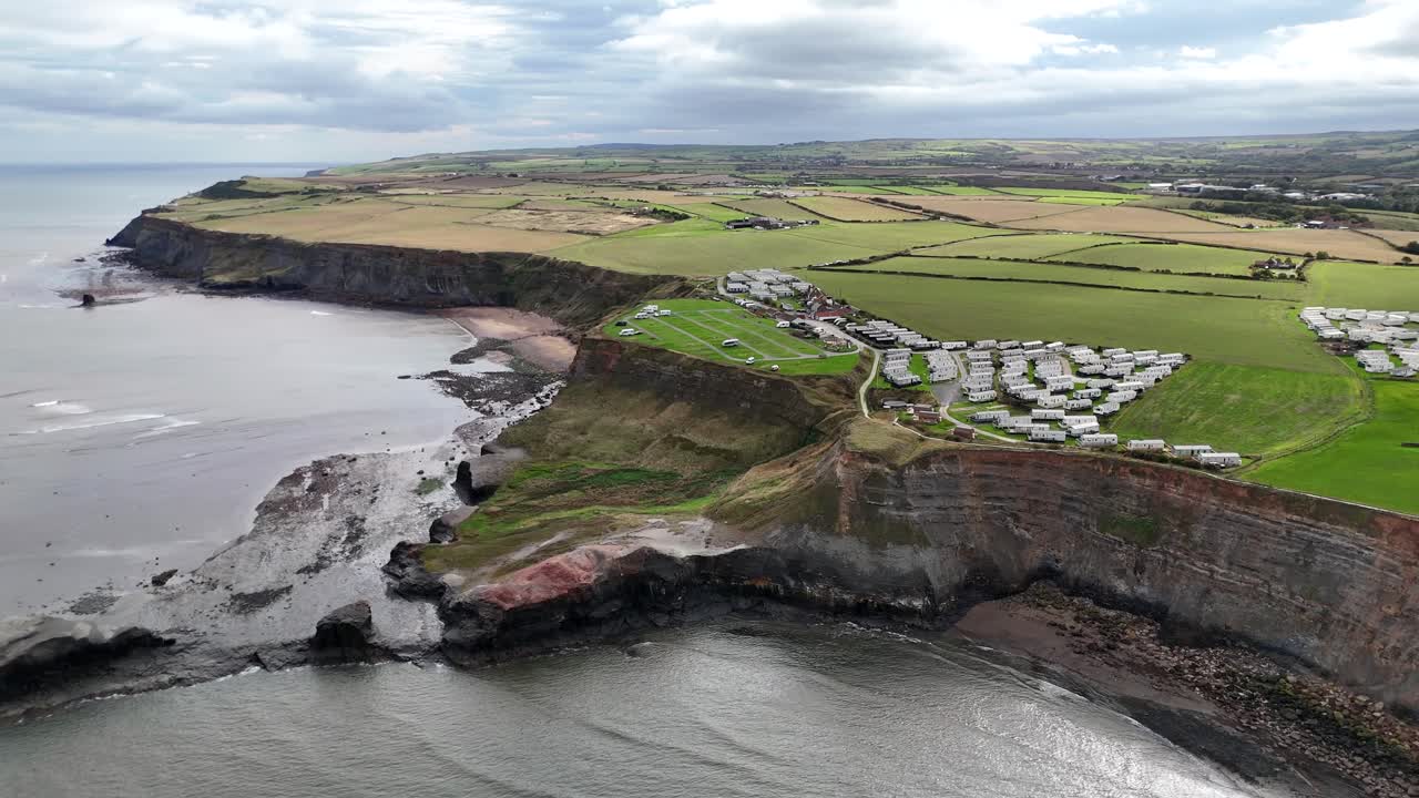 Aerial drone view Whitby Abbey north yorkshire british english seaside port harbour town city england uk