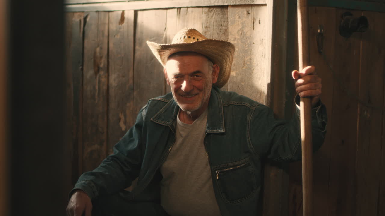 Smiling Senior Farmer in a Rustic Setting