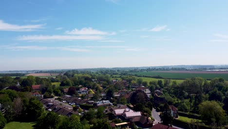 a drone reveal shot from behind trees