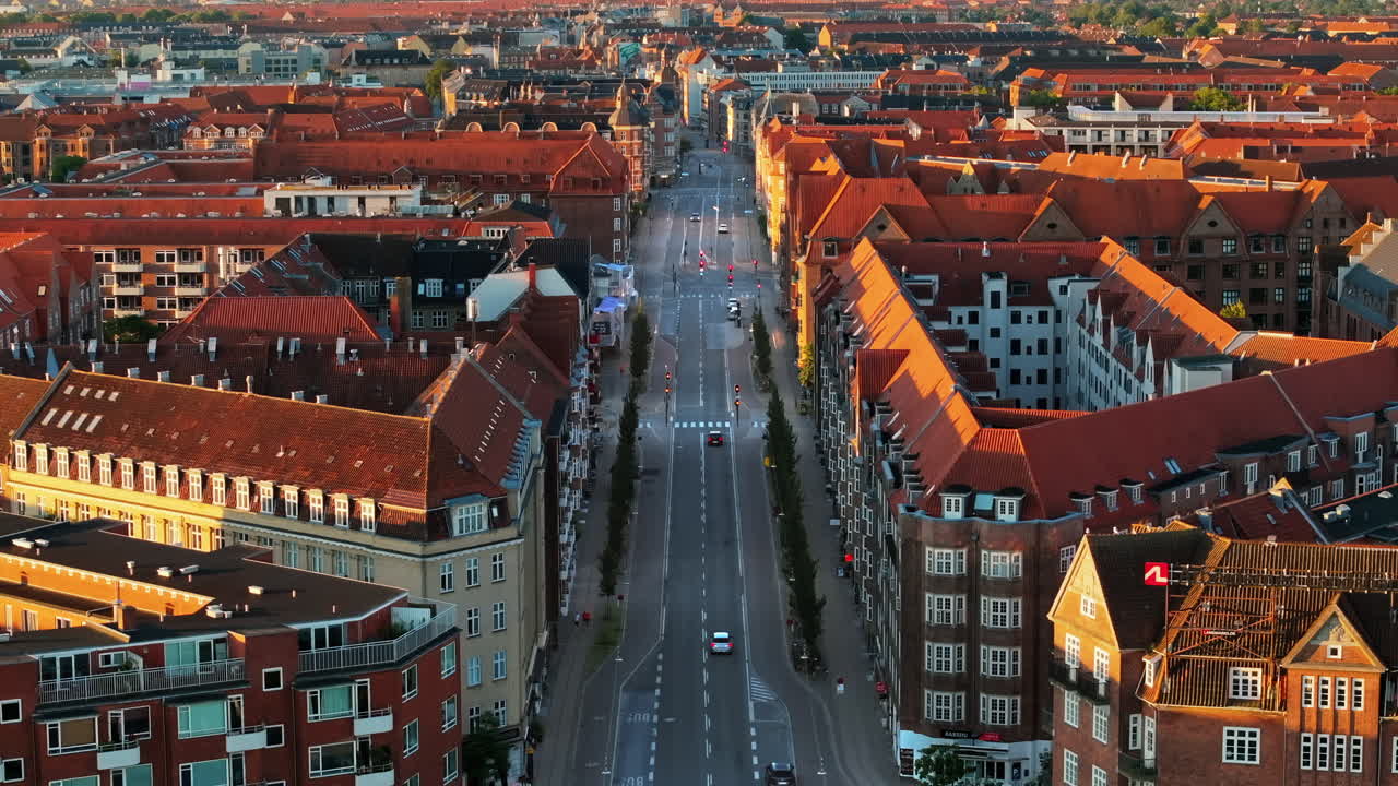 Aerial drone view of Amagerbro area in the northern part of the island Amager in Copenhagen, Denmark at sunset