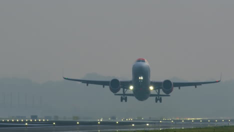 airplane landing/taking off in foggy weather