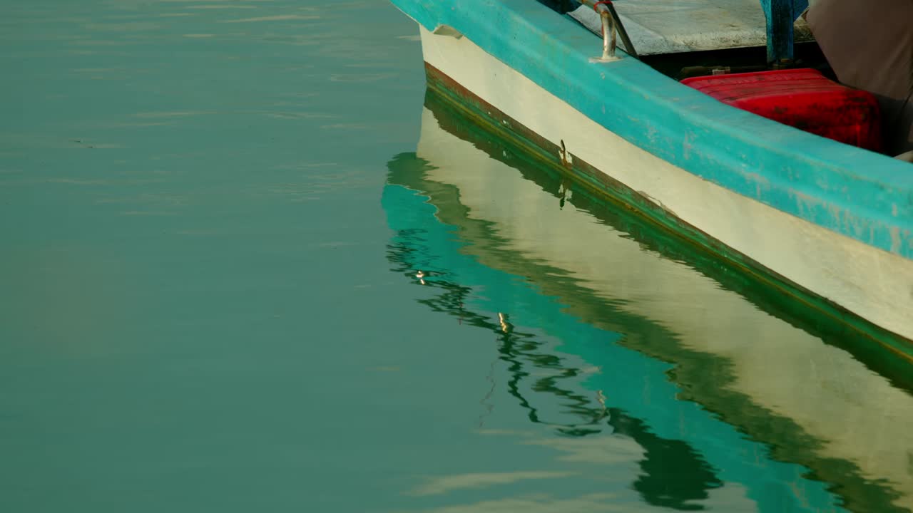Small fishing boat on a calm lake