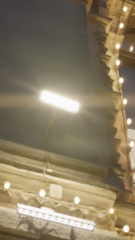 building facade at night with decorative lighting