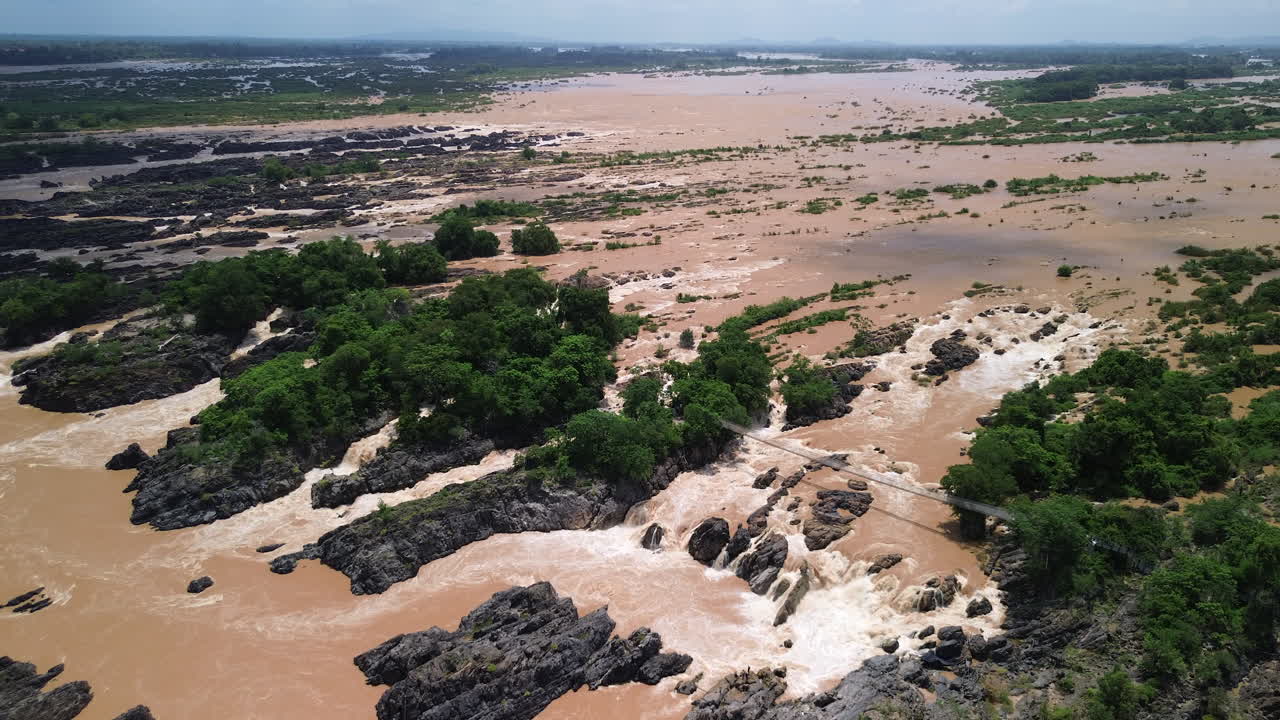 Aerial panoramic static overview of Mekong River flowing past sandbanks and islands in southern Laos, 4000 islands Si Phan Don