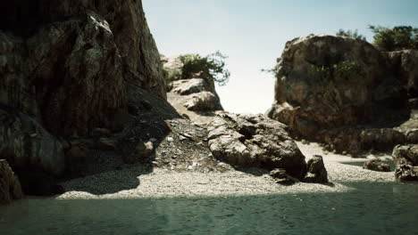 coastal view of a sand beach with cliffs