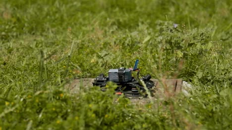 fpv drone taking off from a beautiful green grass