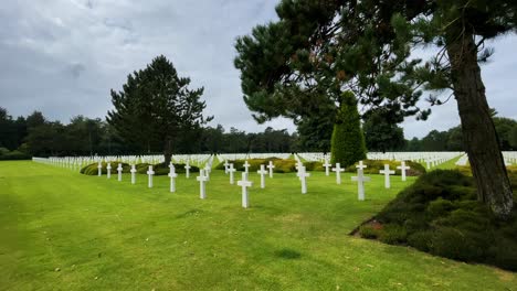 row of us military graves with white cross