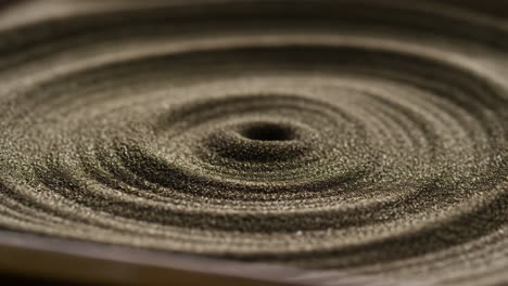 zen garden sand patterns close-up